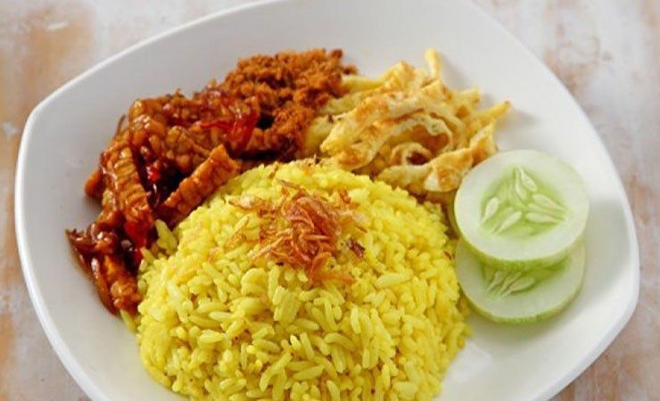 The Taste of Nasi  Kuning  Yellow Rice Culinary Typical 